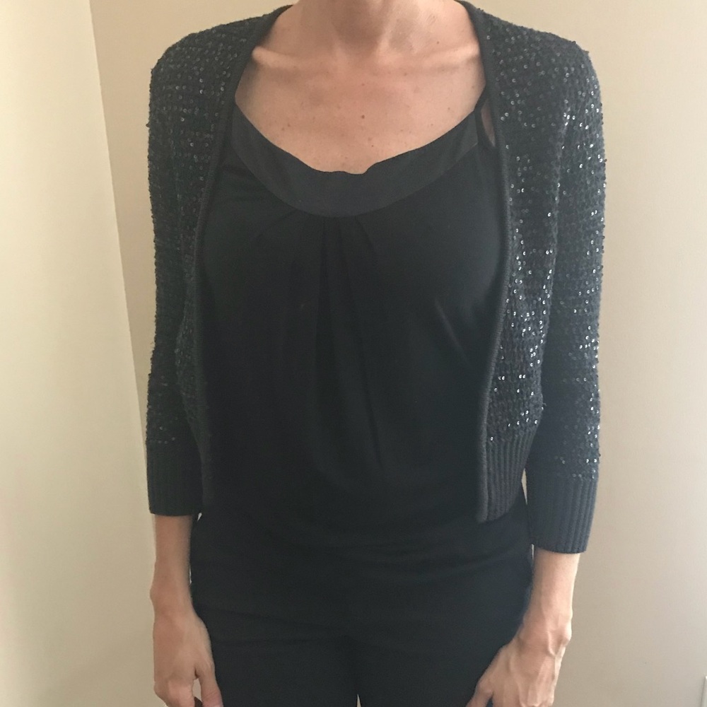 Express sequin shrug.